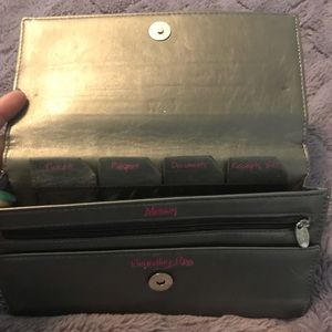 Silver file and fly travel clutch.